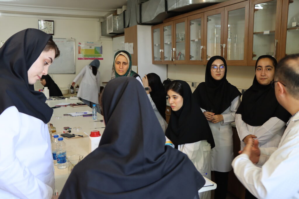 Students taking part in a laboratory session at Afagh